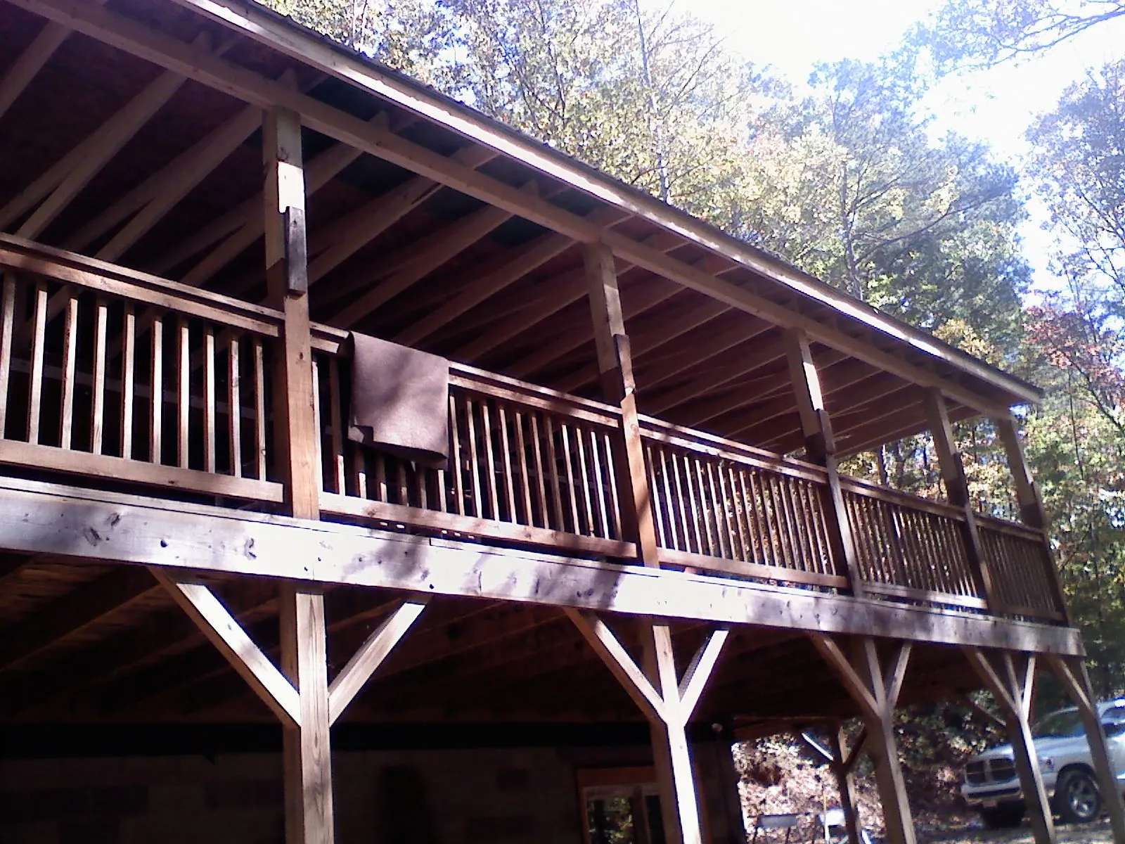Timber framing under a new elevated porch and deck — Roof Leak Repair in Lake by Roofing Brothers